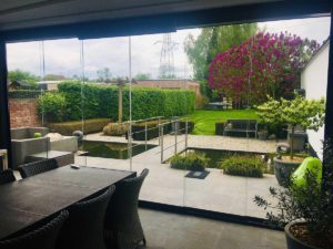 Vrijstaande terrasoverkapping - glazenwand